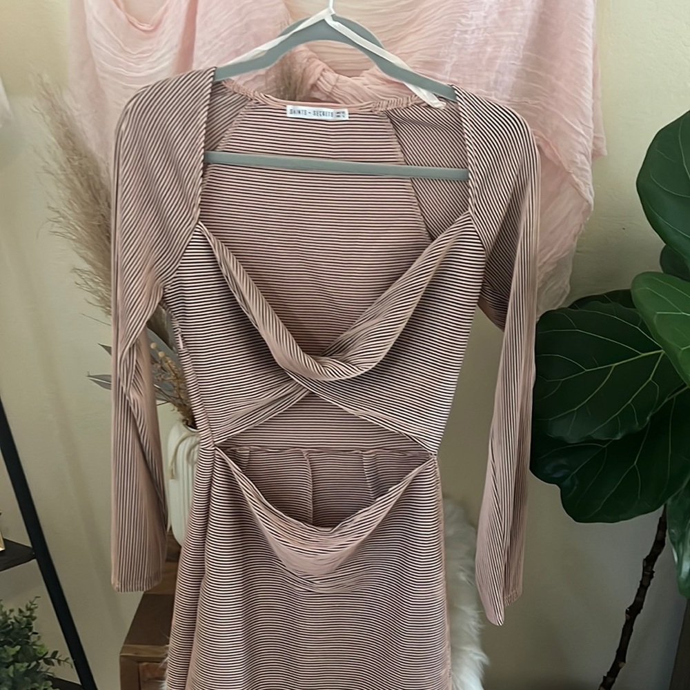 The cutest nude and black dress fitted.